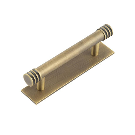 High quality image of Hoxton - Sturt Cabinet Handles 96mm Ctrs Plain Backplate Antique Brass Sku. HOX-450AB-5050AB
