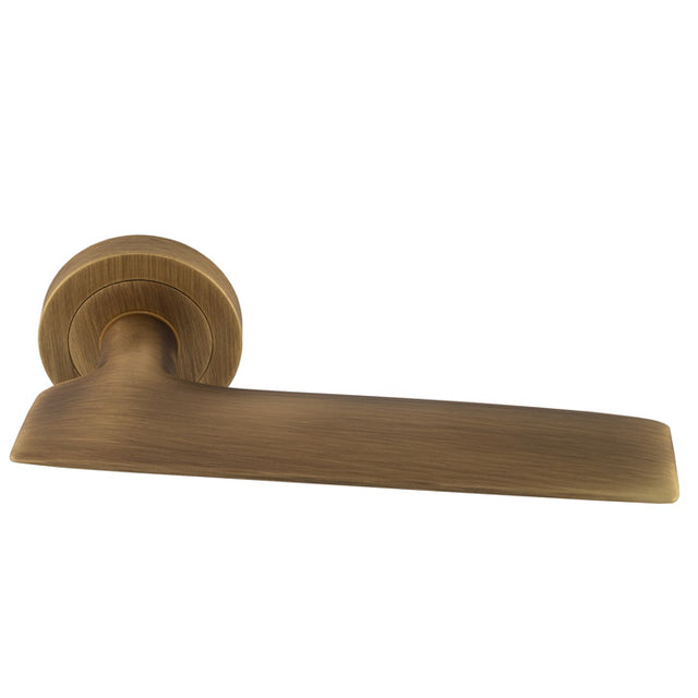 High quality image of Manital - Hygge due Lever on Round Rose - Antique Brass | Sku. hyd5ab | Trade Door Handles.