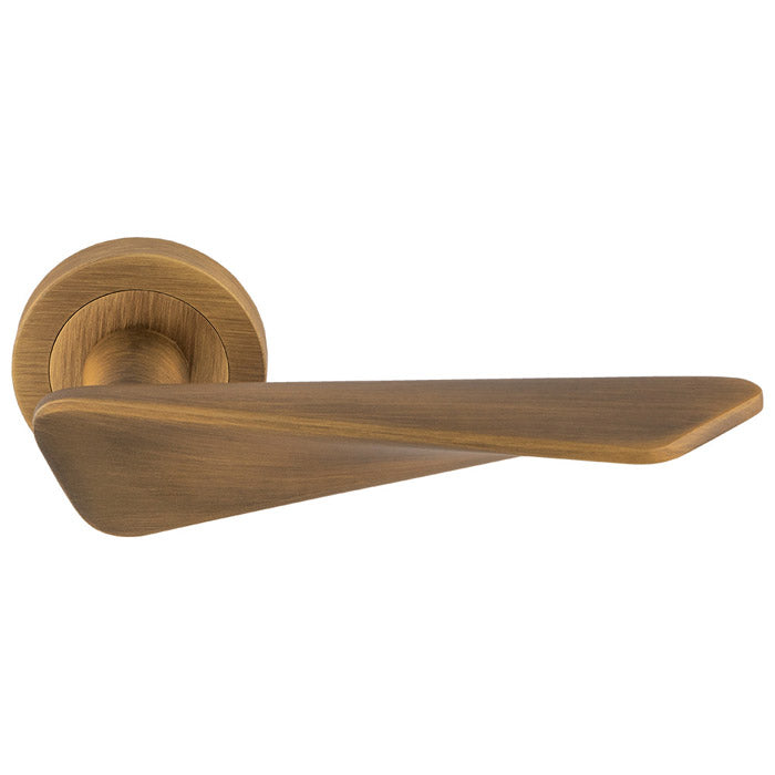 High quality image of Manital - Intona Lever on Round Rose - Antique Brass | Sku. in5ab | Trade Door Handles.