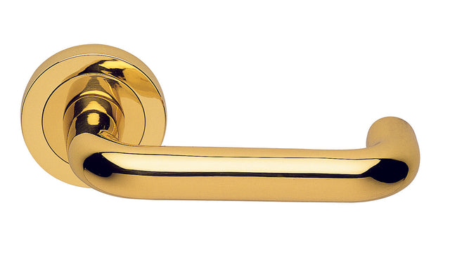 High quality image of Manital - Studio H Lever on Round rose - Polished Brass | Sku. aq2 | Trade Door Handles.