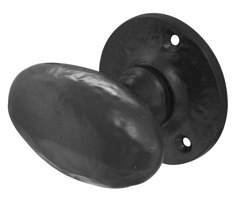 This is an image showing the Frelan - Oval Shaped Mortice Knobs - Antique Black available to order from Trade Door Handles in Kendal