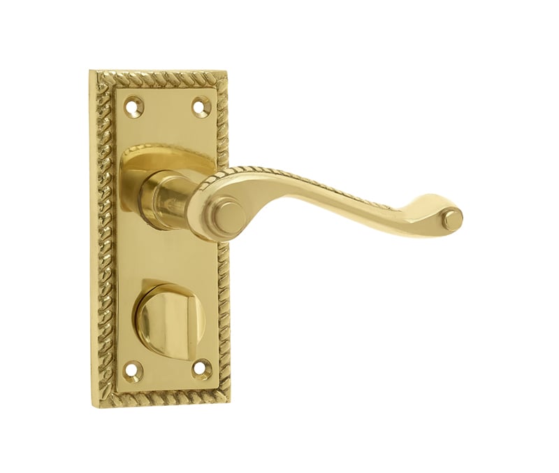 This is an image showing the Frelan - Georgian Suite Door Handle on Privacy Plate Polished Brass available to order from Trade Door Handles in Kendal