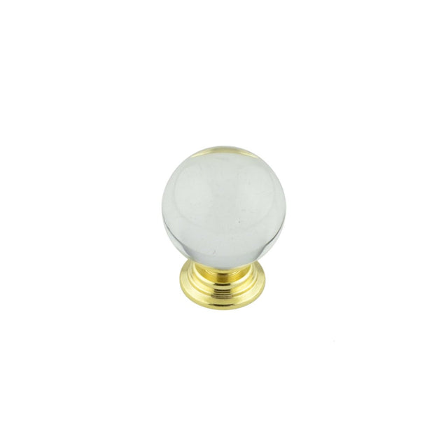 This is an image showing the Frelan - 25mm Brass Finish Clear Glass Ball Cupboard Knob available to order from Trade Door Handles in Kendal