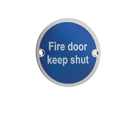 This is an image showing the Frelan - Fire Door Keep Shut' - Signage 75mm Dia. - Satin Stainless Steel available to order from Trade Door Handles in Kendal