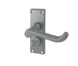 This is an image showing the Frelan - Victorian Scroll Door Handle on Privacy Plate Satin Chrome available to order from Trade Door Handles in Kendal