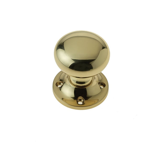 This is an image showing the Frelan - Mushroom Unsprung Rim Knobs - Polished Brass available to order from Trade Door Handles in Kendal