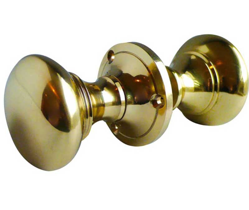 This is an image showing the Frelan - Kontrax Rim Knobs - Polished Brass available to order from Trade Door Handles in Kendal