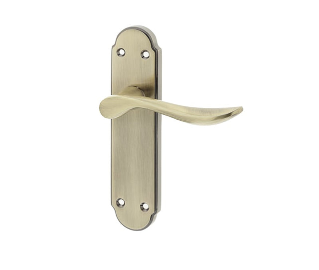 This is an image showing the Frelan - Henley Lever Latch Handles on Backplate - Antique Brass available to order from Trade Door Handles in Kendal