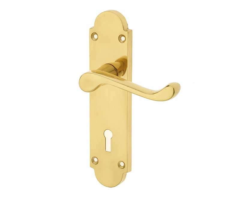 This is an image showing the Frelan - Epsom Standard Lock Handles on Backplates - Polished Brass available to order from Trade Door Handles in Kendal