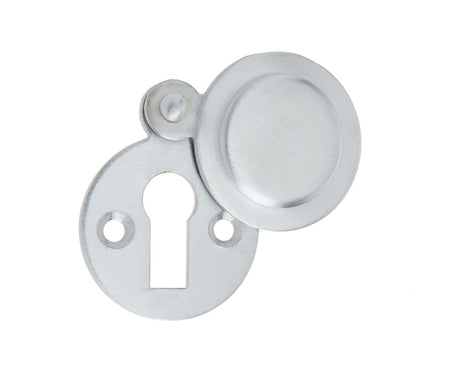 This is an image showing the Frelan - Round Covered Escutcheon Standard Keyway - Satin Chrome available to order from Trade Door Handles in Kendal