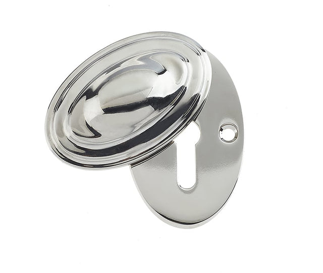 This is an image showing the Frelan - Oval Covered Escutcheon Standard Keyway - Polished Nickel available to order from Trade Door Handles in Kendal