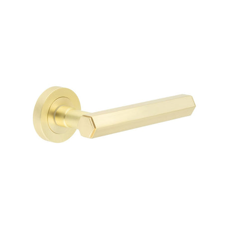 This is an image showing the Frelan - Jedo Hex Satin Brass Door Handle available to order from Trade Door Handles in Kendal