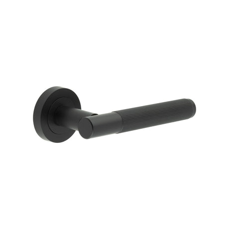 This is an image showing the Frelan - Venice Matt Black Lever on rose available to order from Trade Door Handles in Kendal