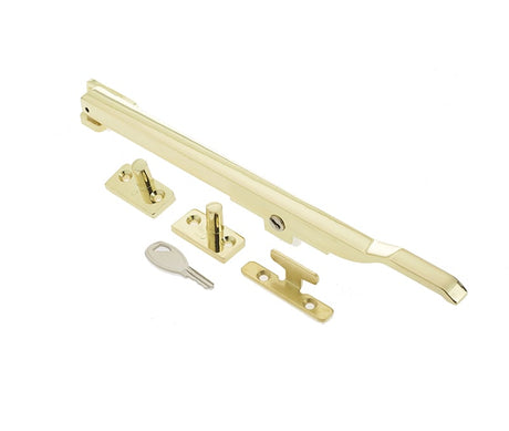 This is an image showing the Frelan - Modern 250mm Lockable Casement Stay - Polished Brass available to order from Trade Door Handles in Kendal