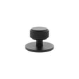 Quality image of Millhouse Brass Eiffel Knurled Round Cabinet Knob Handle on Backplate - Matt Black | Sku. mhckb1532mb | available from Trade Door Handles.