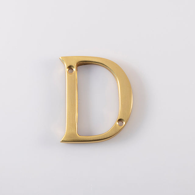 High quality image of Carlisle Brass - Letter D - Polished Brass | Sku. nd | Trade Door Handles.