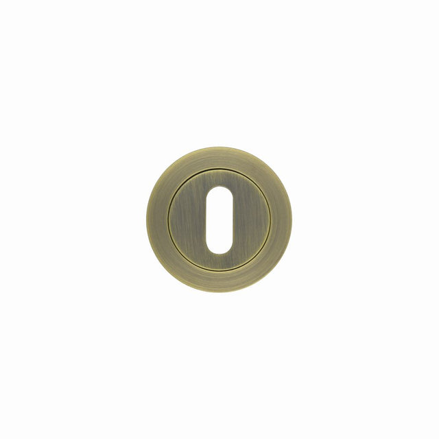 High quality image of the Rosso Maniglie - Standard Profile Escutcheon 50mm dia - Antique Brass | Sku. rm002ab | available to order from Trade Door Handles.