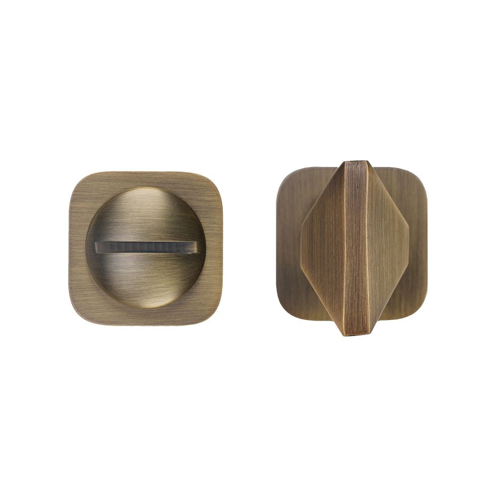 High quality image of the Rosso Tecnica - Turn and Release - Rosso Mini Squircle - Antique Brass | Sku. RT004-MINISQ-AB | available to order from Trade Door Handles.