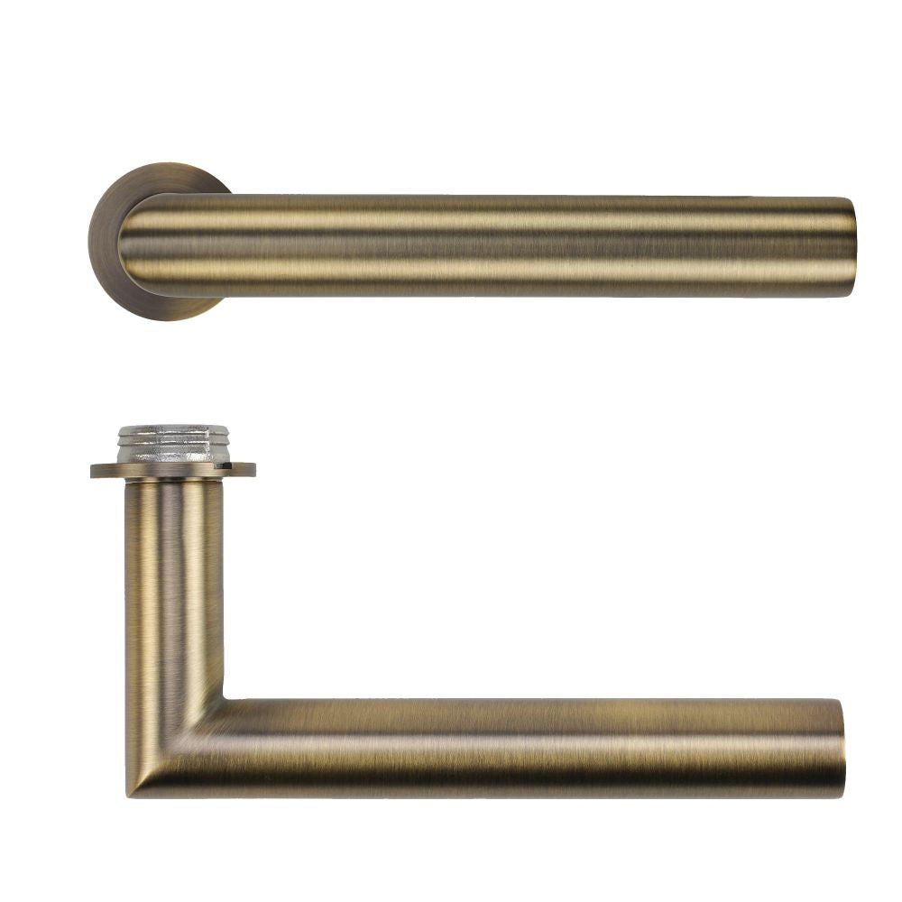 High quality image of the Rosso Tecnica - Lugano Lever on 32mm Round Mini Rose - Antique Brass | Sku. RT010-MINI-AB | available to order from Trade Door Handles.