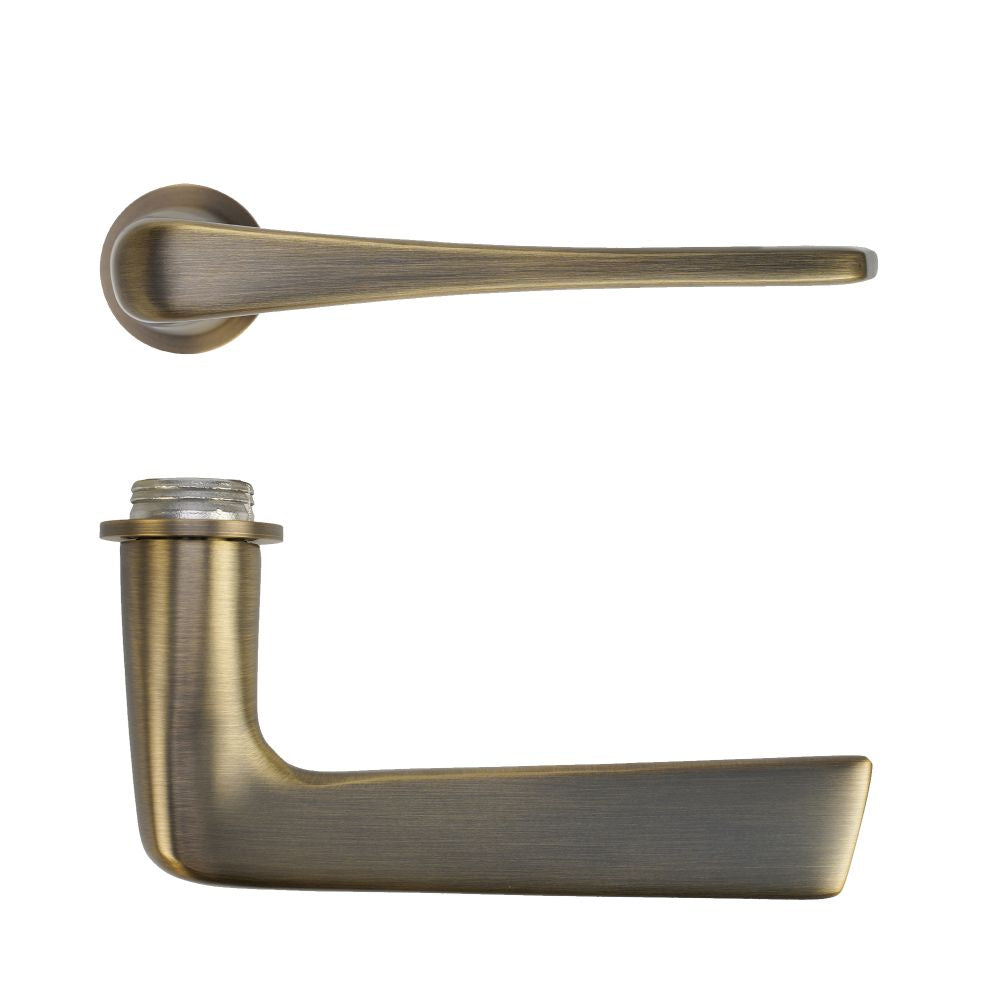 High quality image of the Rosso Tecnica - Como Lever on 32mm Round Mini Rose - Antique Brass | Sku. RT020-MINI-AB | available to order from Trade Door Handles.