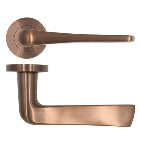 High quality image of the Rosso Tecnica - Como Lever on Round Rose - PVD Satin Bronze | Sku. rt020pvdbz | available to order from Trade Door Handles.
