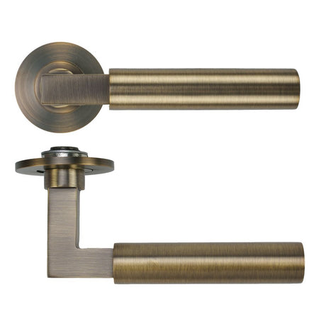 High quality image of the Rosso Tecnica - Garda Lever on 4mm Round Slim Sprung Rose - Antique Brass | Sku. RT050-SLIM-AB | available to order from Trade Door Handles.