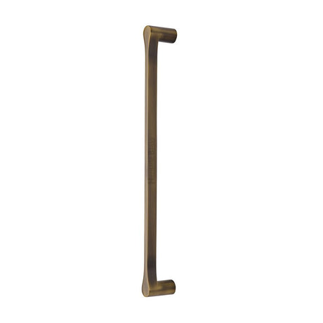 High quality image of Heritage Brass - Door Pull Handle Gio Design 332mm Antique Brass Finish | Sku. v1238-332-at | available to order from Trade Door Handles in Kendal.
