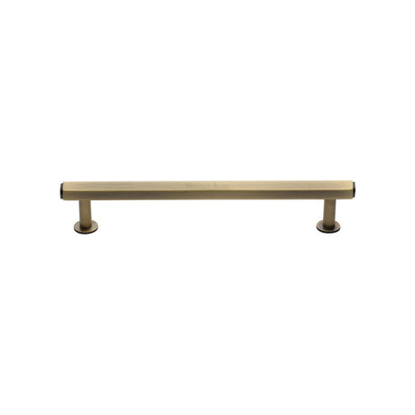High quality image of Heritage Brass - Cabinet Pull Hexagon Design with Rose 128mm CTC Antique Brass Fini | Sku. v4423-128-at | Trade Door Handles, Kendal.