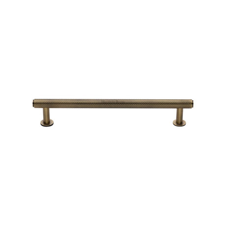 High quality image of Heritage Brass - Cabinet Pull Knurled Design with Rose 128mm CTC Antique Brass Fini | Sku. v4459-128-at | Trade Door Handles, Kendal.
