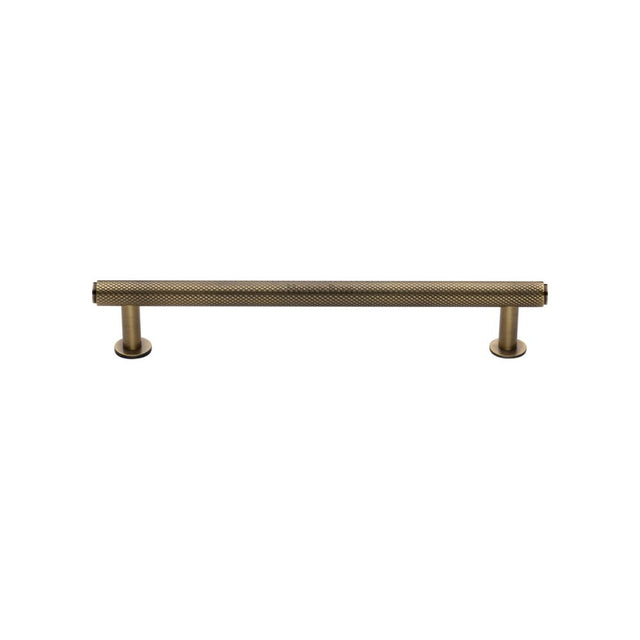High quality image of Heritage Brass - Cabinet Pull Knurled Design with Rose 128mm CTC Antique Brass Fini | Sku. v4459-128-at | Trade Door Handles, Kendal.