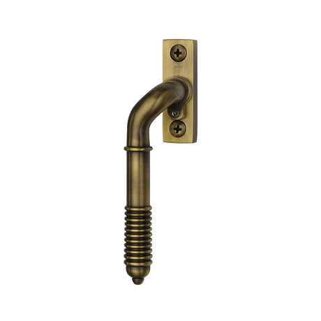 High quality image of Heritage Brass - Lockable Espagnolette Left Handed Reeded Design Antique Brass finish | Sku. v895l-lh-at | available to order from Trade Door Handles in Kendal.