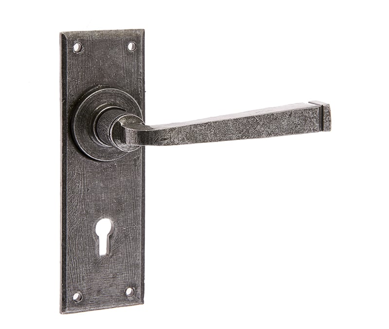 This is an image showing the Frelan - Valley Forge Standard Lever Lock Handles on Backplate - Pewter available to order from Trade Door Handles in Kendal