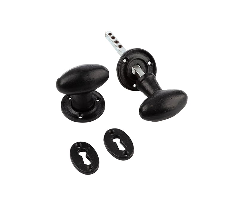 This is an image showing the Frelan - Valley Forge Oval Mortice Knobs - Black available to order from Trade Door Handles in Kendal