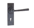 This is an image showing the Frelan - Valley Forge Standard Lever Lock Handles on Backplate - Beeswax available to order from Trade Door Handles in Kendal