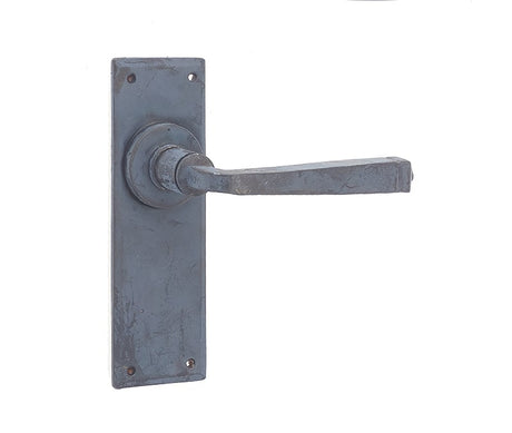 This is an image showing the Frelan - Valley Forge Lever Latch Handles on Backplate - Beeswax available to order from Trade Door Handles in Kendal