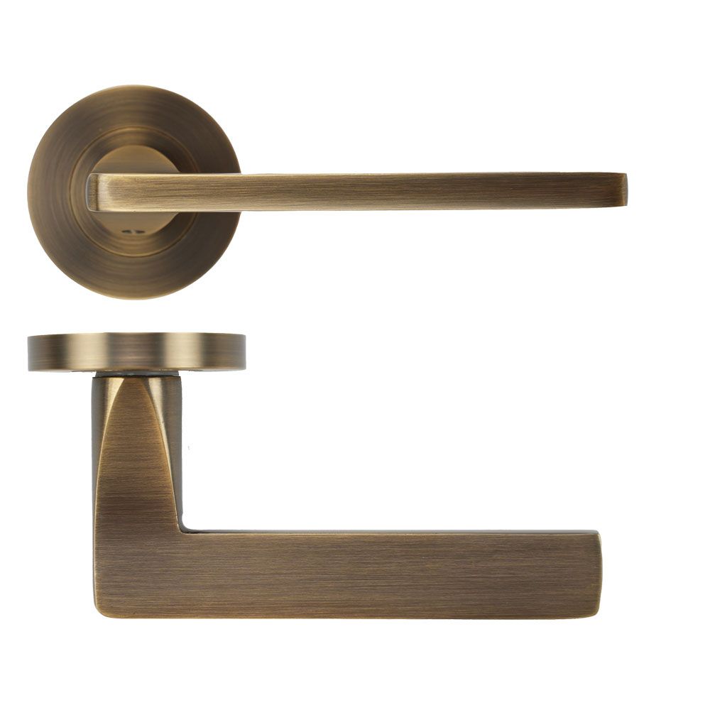 High quality image of the STANZA - Leon Lever on Rose - Antique Brass | Sku. ZPA010-AB | available to order from Trade Door Handles.