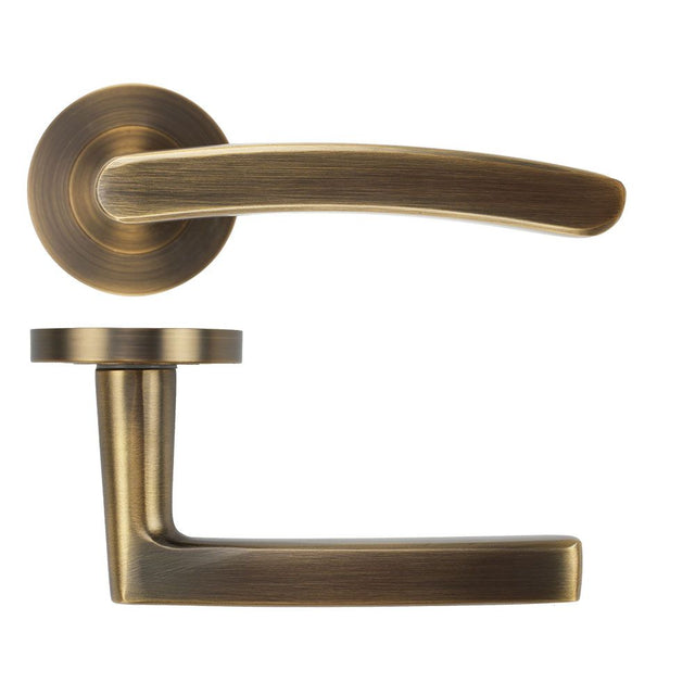 High quality image of the STANZA - Santiago Lever on Rose - Antique Brass | Sku. ZPA020-AB | available to order from Trade Door Handles.