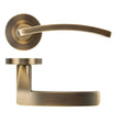 High quality image of the STANZA - Toledo Lever on Rose - Antique Brass | Sku. ZPA030-AB | available to order from Trade Door Handles.