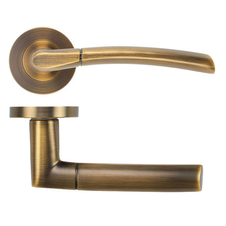 High quality image of the STANZA - Andorra Lever on Rose - Antique Brass | Sku. ZPA100-AB | available to order from Trade Door Handles.