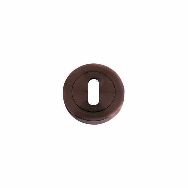 High quality image of the STANZA - Escutcheon Standard Profile (50mm Dia.) - Bronze | Sku. zpz002-etb | available to order from Trade Door Handles.