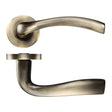 High quality image of the STANZA - Siena Lever - Screw On Rose - Florentine Bronze | Sku. zpz050fb | available to order from Trade Door Handles.