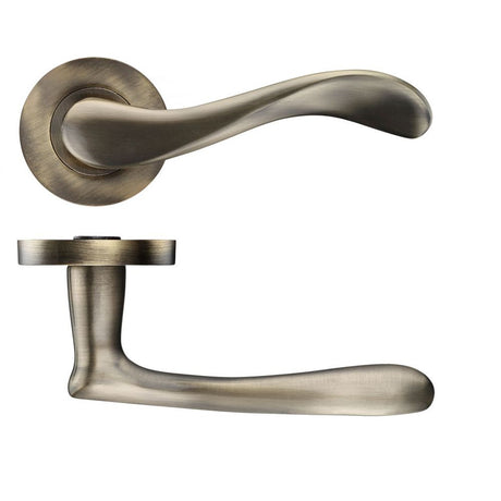 High quality image of the STANZA - Asti lever on round rose - Bronze | Sku. zpz230fb | available to order from Trade Door Handles.