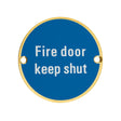 High quality image of the Zoo Hardware - Signage - Fire Door Keep Shut - 76mm dia PVD Satin Brass | Sku. zss09-pvdsb | available to order from Trade Door Handles.