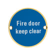 High quality image of the Zoo Hardware - Signage - Fire Door Keep Clear - 76mm dia PVD Satin Brass | Sku. zss11-pvdsb | available to order from Trade Door Handles.