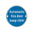 High quality image of the Zoo Hardware - Signage - Automatic Fire Door Keep Clear - 76mm dia - Polished Stainless Steel | Sku. zss12ps | available to order from Trade Door Handles.