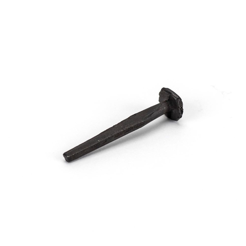 This is an image showing From The Anvil - Black Oxide 1 1/2" Rosehead Nail (1kg) available from trade door handles, quick delivery and discounted prices