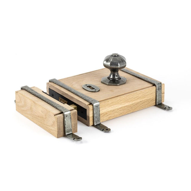 This is an image showing From The Anvil - Pewter Oak Box Lock & Octagonal Knob Set available from trade door handles, quick delivery and discounted prices