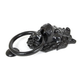 This is an image showing From The Anvil - Black Lion Head Door Knocker available from trade door handles, quick delivery and discounted prices