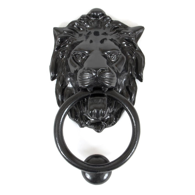 This is an image showing From The Anvil - Black Lion Head Door Knocker available from trade door handles, quick delivery and discounted prices