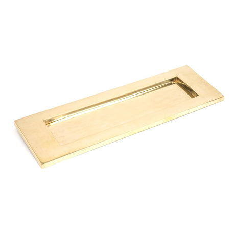 This is an image showing From The Anvil - Polished Brass Large Letter Plate available from trade door handles, quick delivery and discounted prices